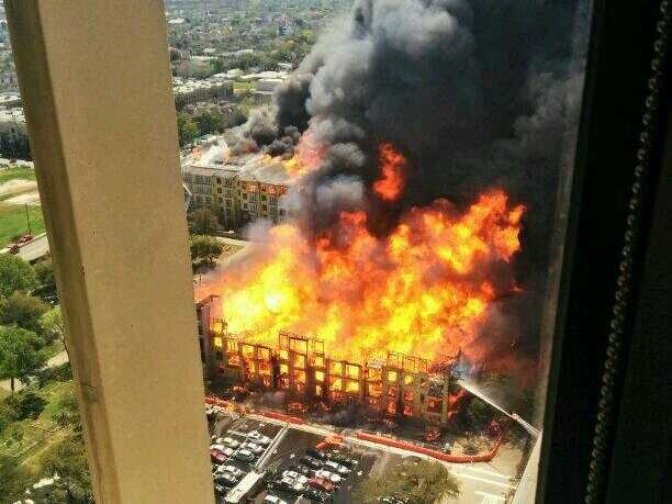 http://www.reho.st/static6.businessinsider.com/image/5331ca8decad04bf33f51195/a-massive-building-fire-is-raging-near-downtown-houston.jpg